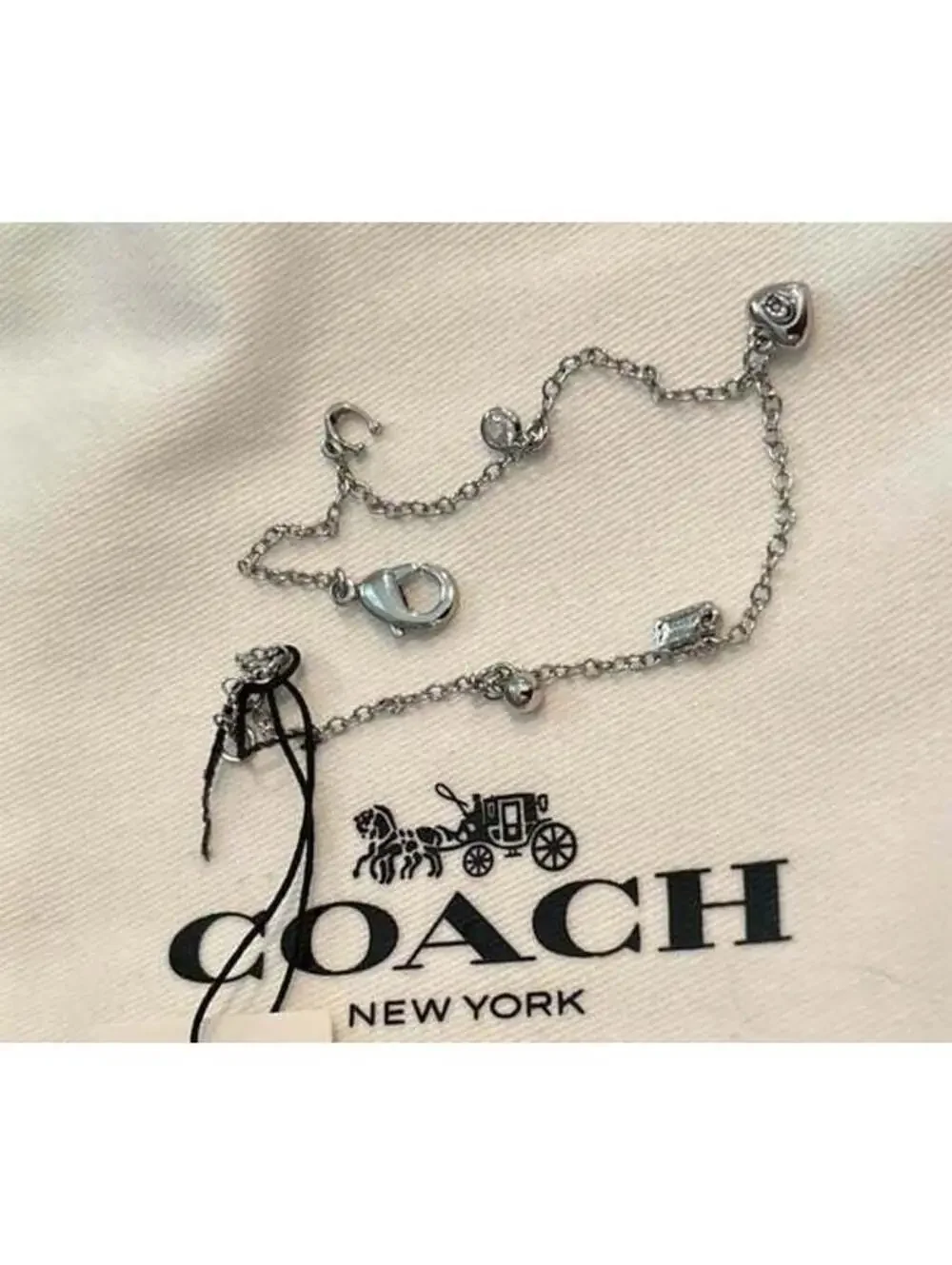 Coach Silver Tone Charm Bracelet with Heart and Logo Charms